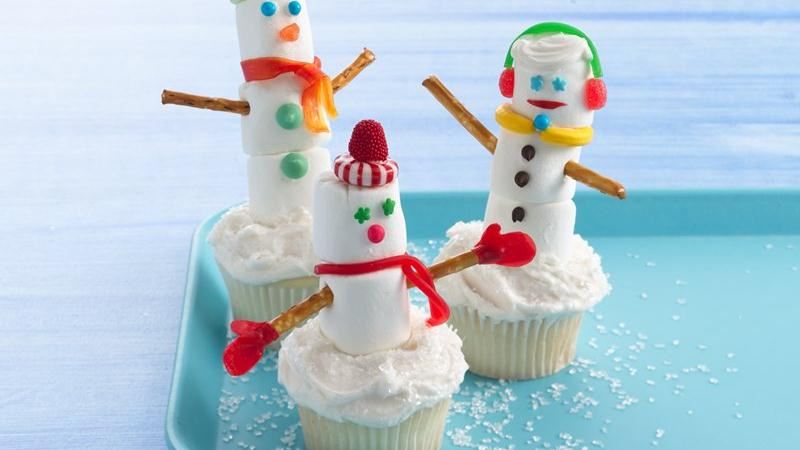 Winter party? Welcome kids and kids-at-heart into a warm home with frosty snowmen cupcakes. 
